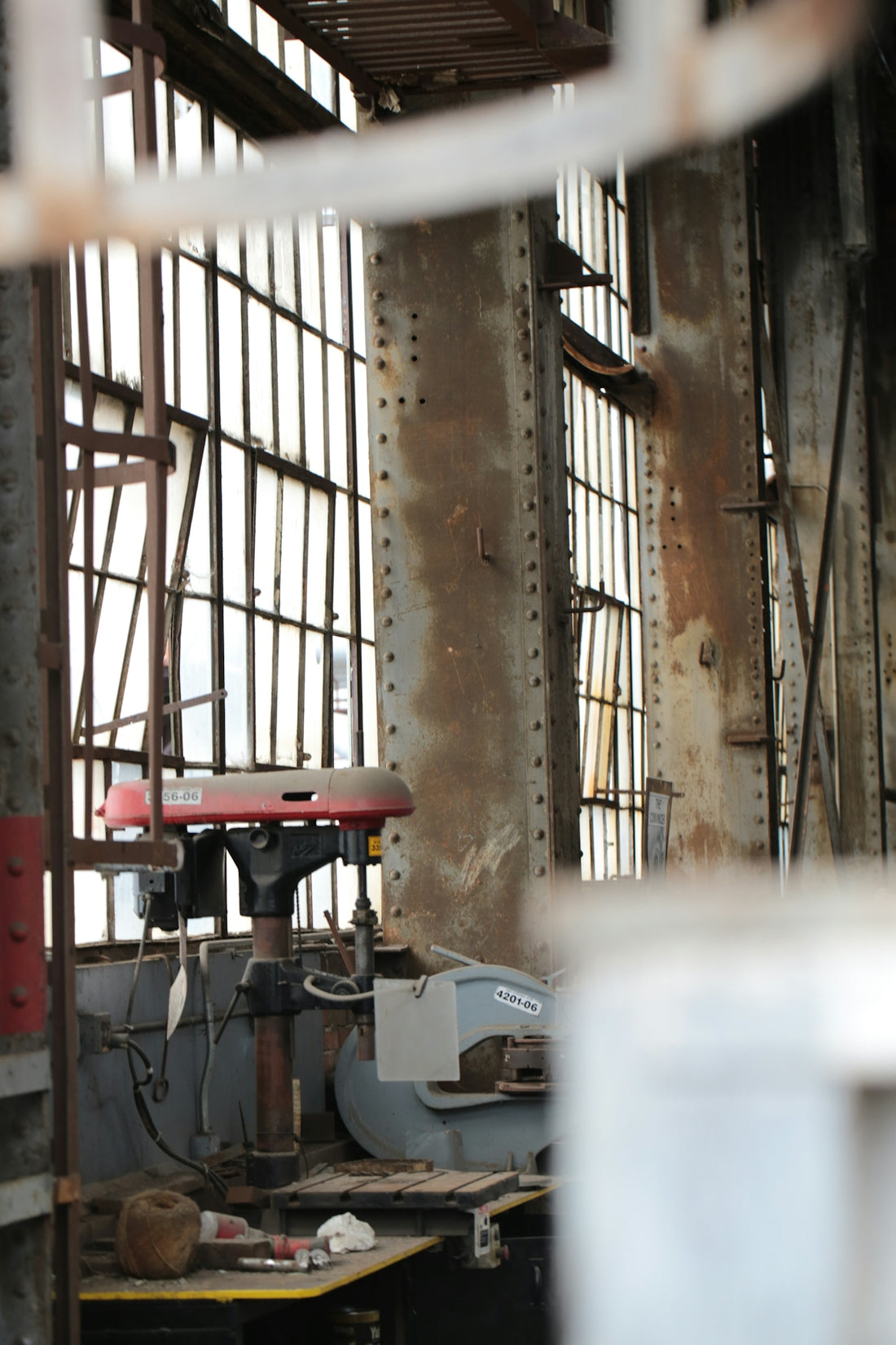 Industrial workshop with machinery and large windows