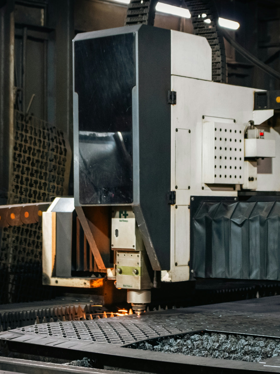 Industrial laser cutting machine working on metal