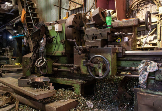 Industrial lathe machine with metal shavings