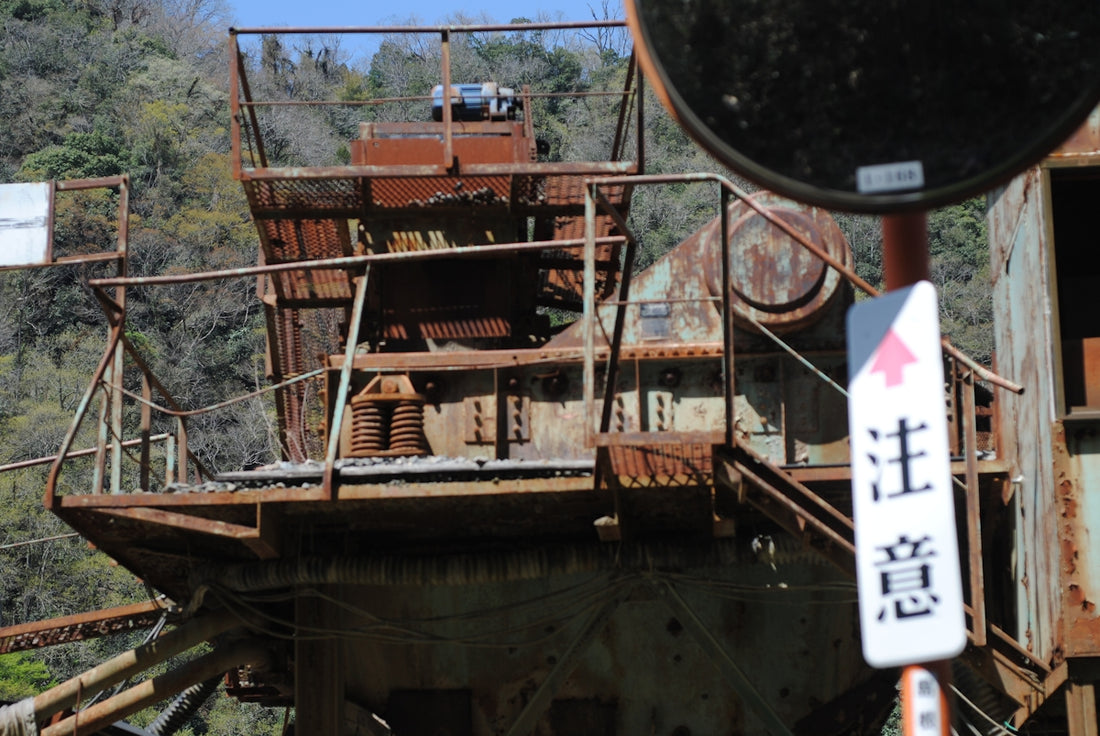 Abandoned industrial machinery with rust and decay