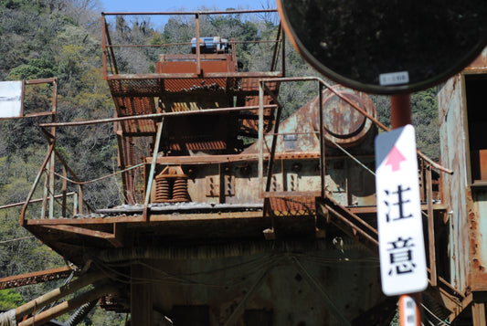 Abandoned industrial machinery with rust and decay