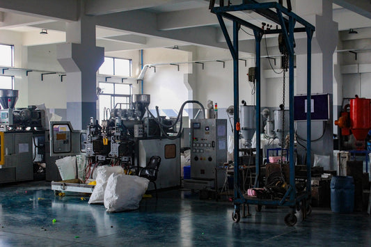 Industrial factory interior with machinery and equipment.